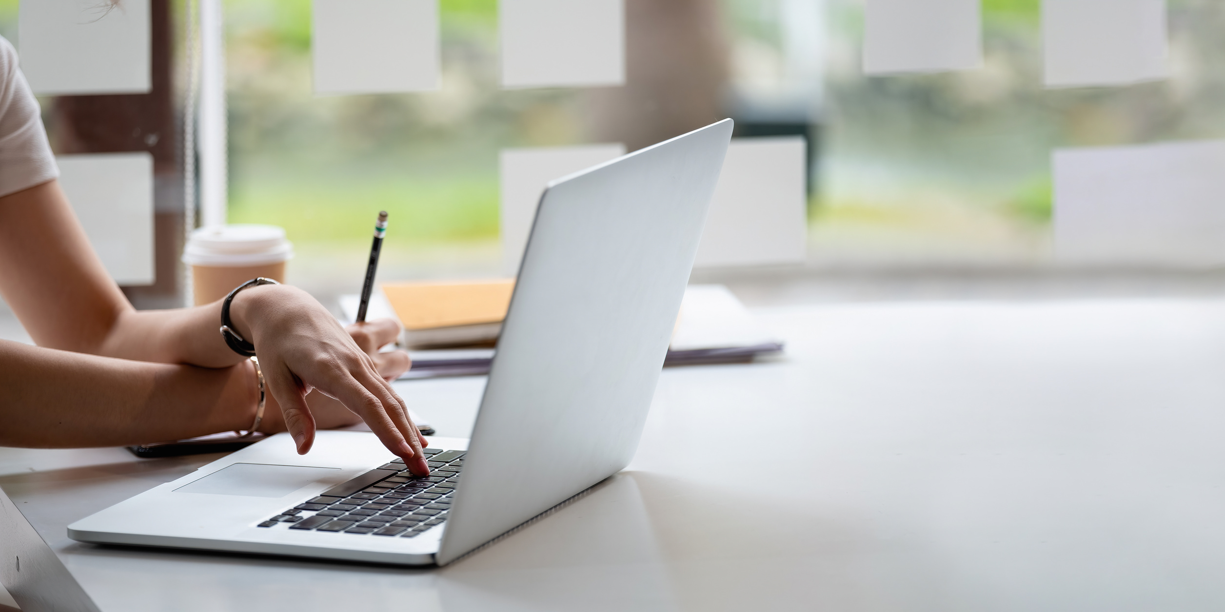 Woman Typing on Computer 